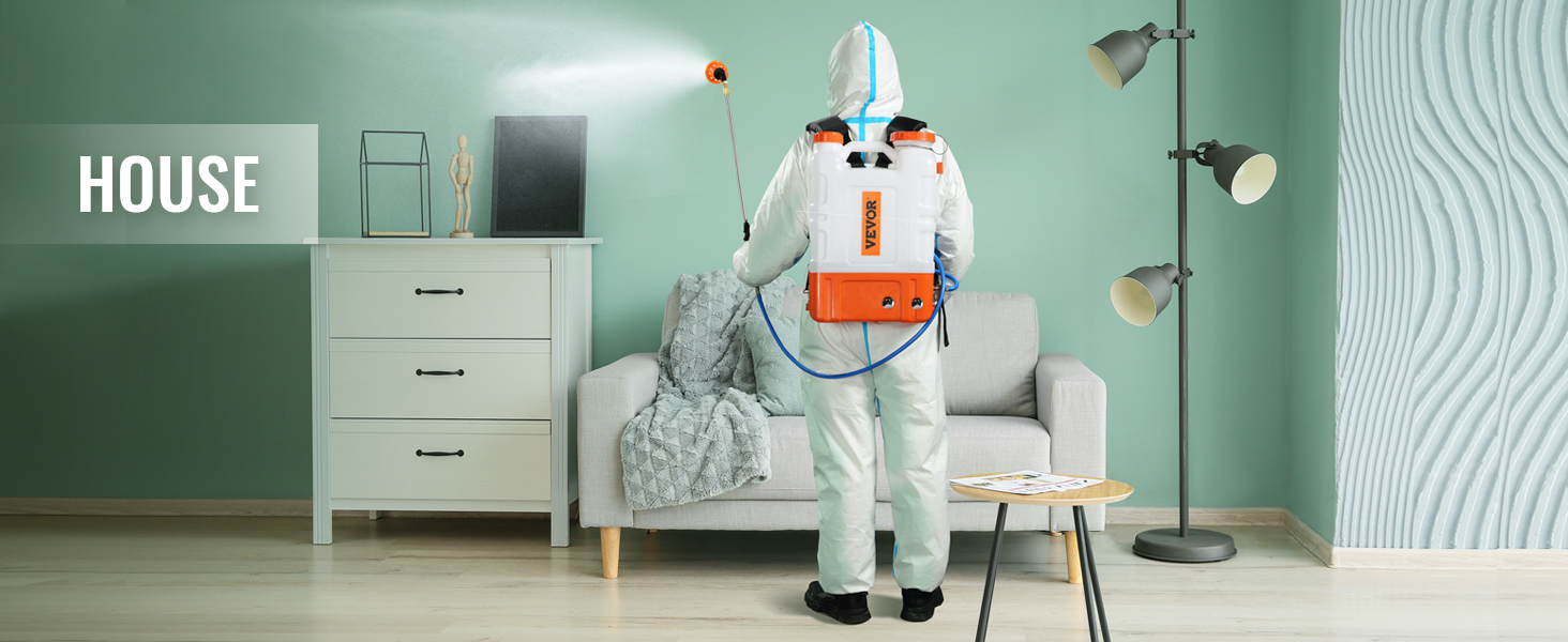 person using VEVOR backpack sprayer indoors, spraying in a pastel green room with modern decor.