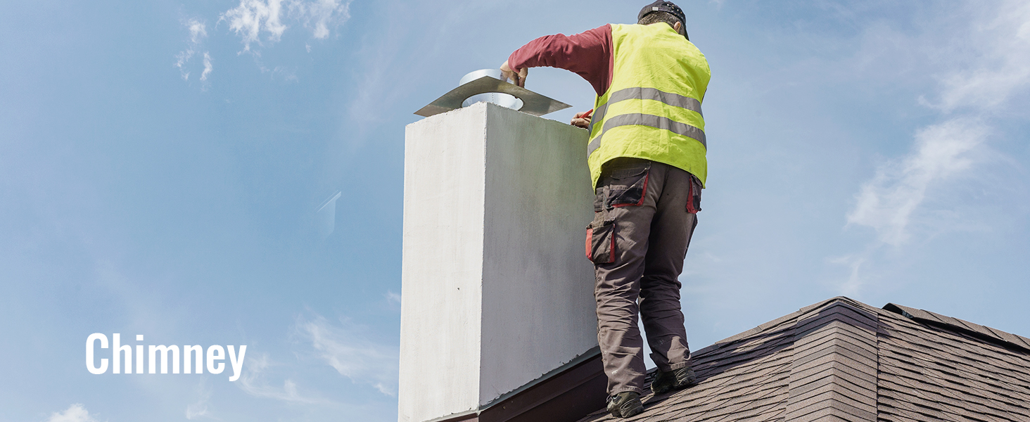 worker in safety vest repairing a chimney on a roof under a clear blue sky. VEVOR sewer camera not visible.